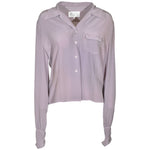 camicia maniche lunghe collo aperto con taschino e spalle arricciate e pences in vita 