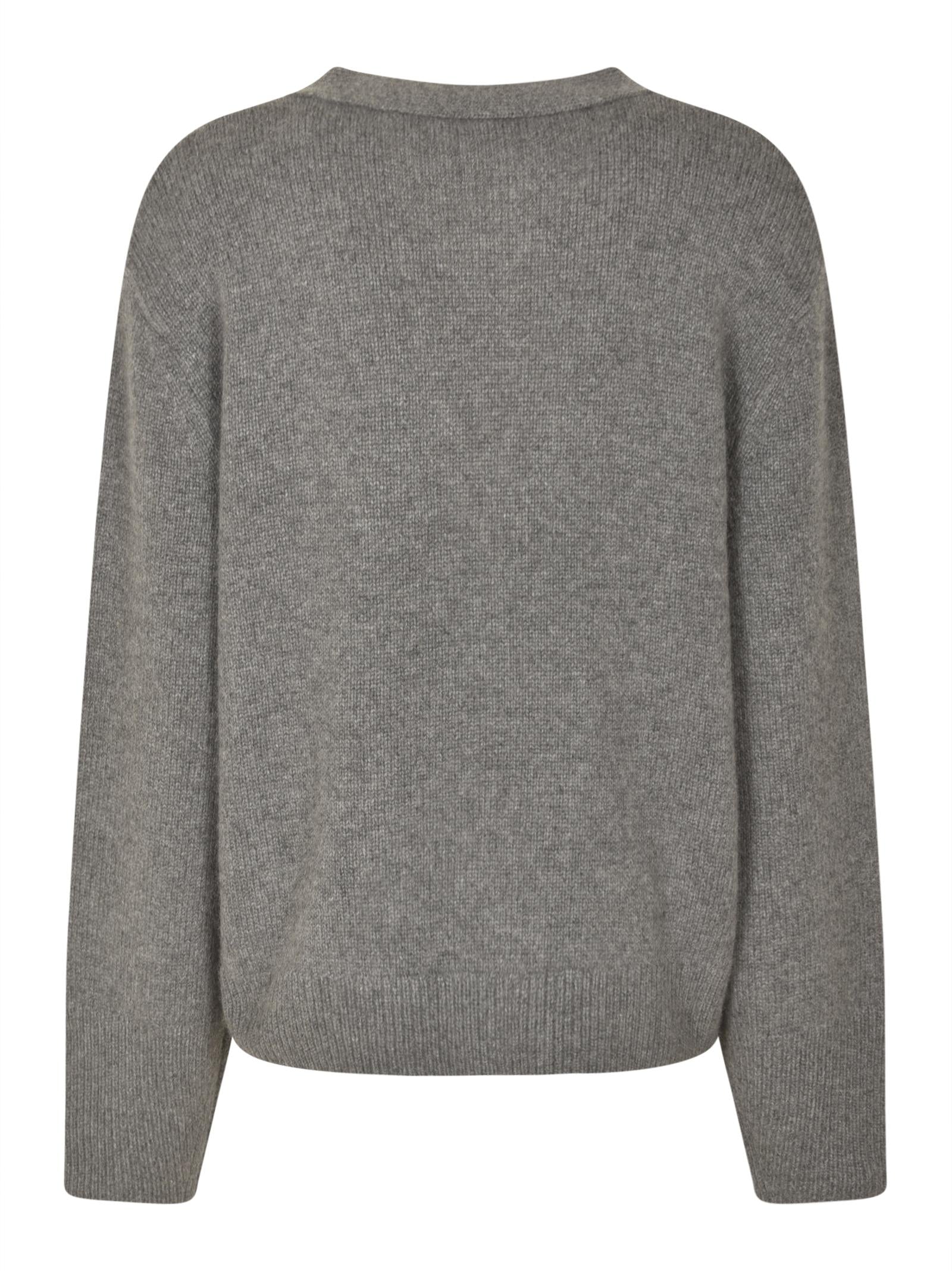 cardigan over tasche 