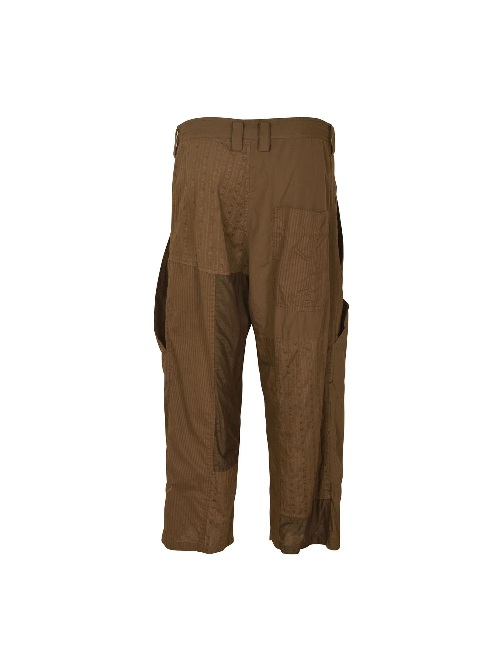 pantaloni con pences e coulisse 