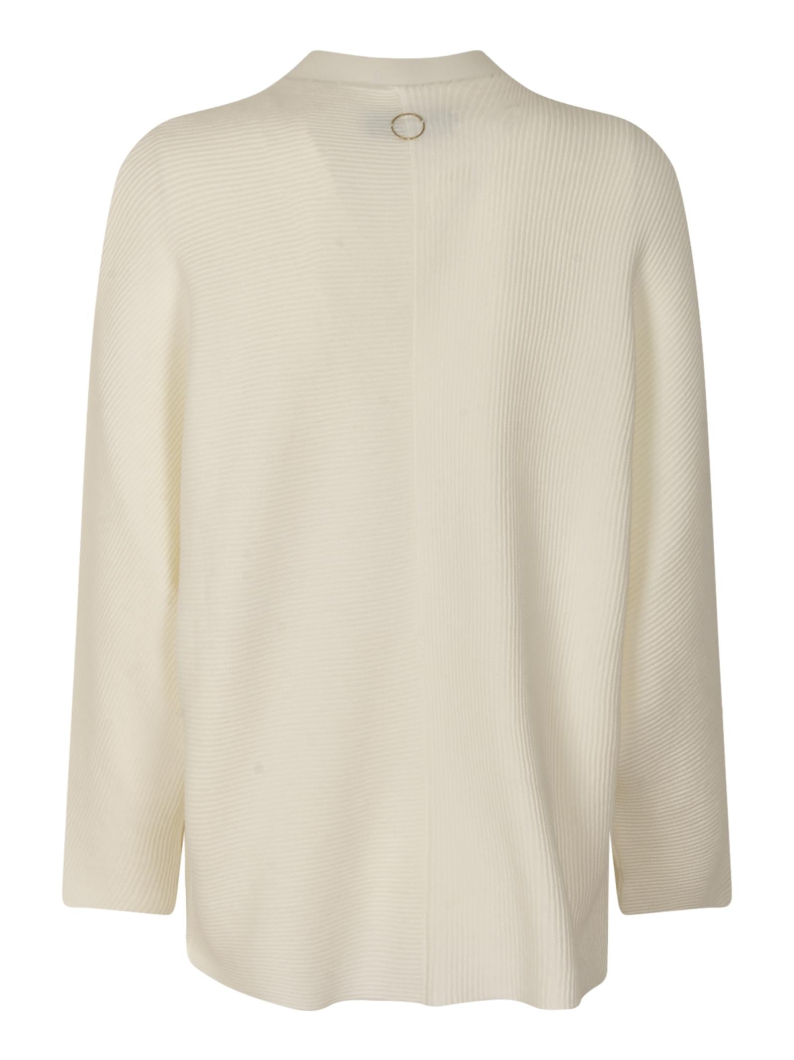 cardigan con spilla 
