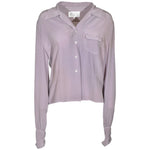 camicia maniche lunghe collo aperto con taschino e spalle arricciate e pences in vita 
