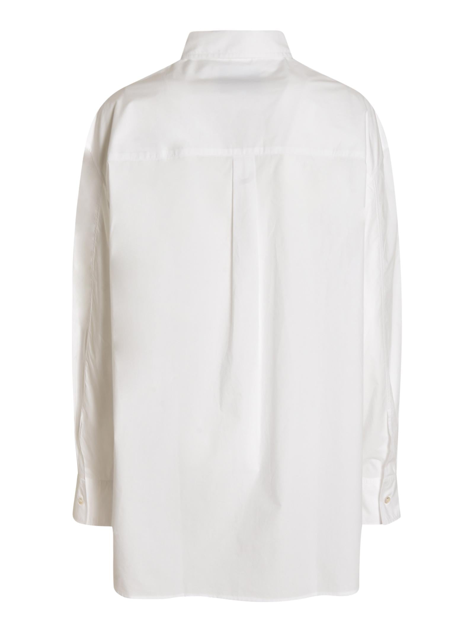 camicia over tasca 